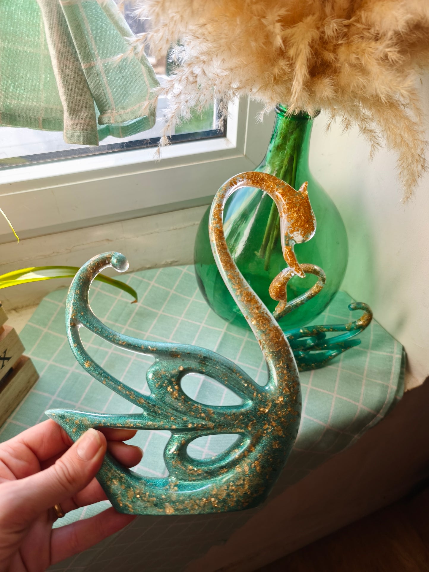 Couple cygnes vert et or.